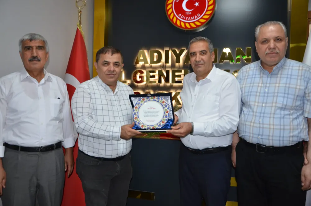 İl Genel Meclis Üyeleri’nden Işık’a Plaket